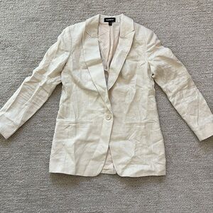 Express woman’s blazer cream color